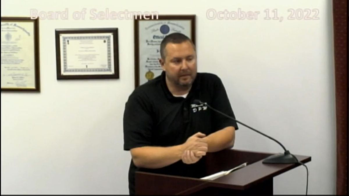 A man at a podium.